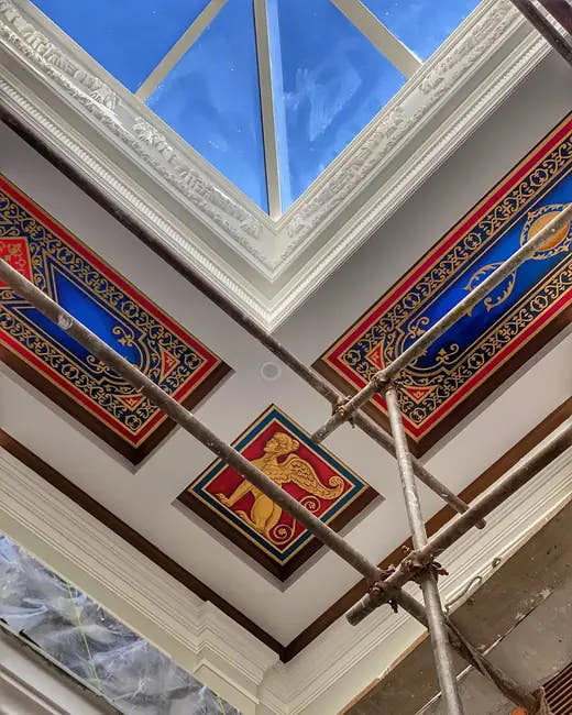 Skylight mouldings and painted panels during installation